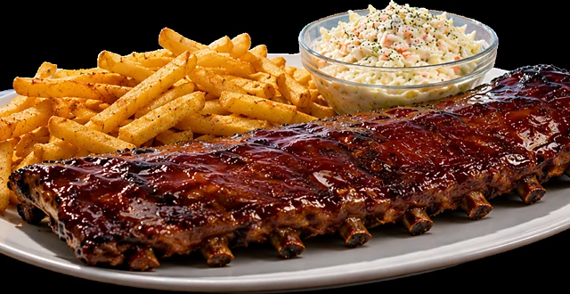 Teller mit glasierten Spareribs, Pommes frites und einer Schale Coleslaw
